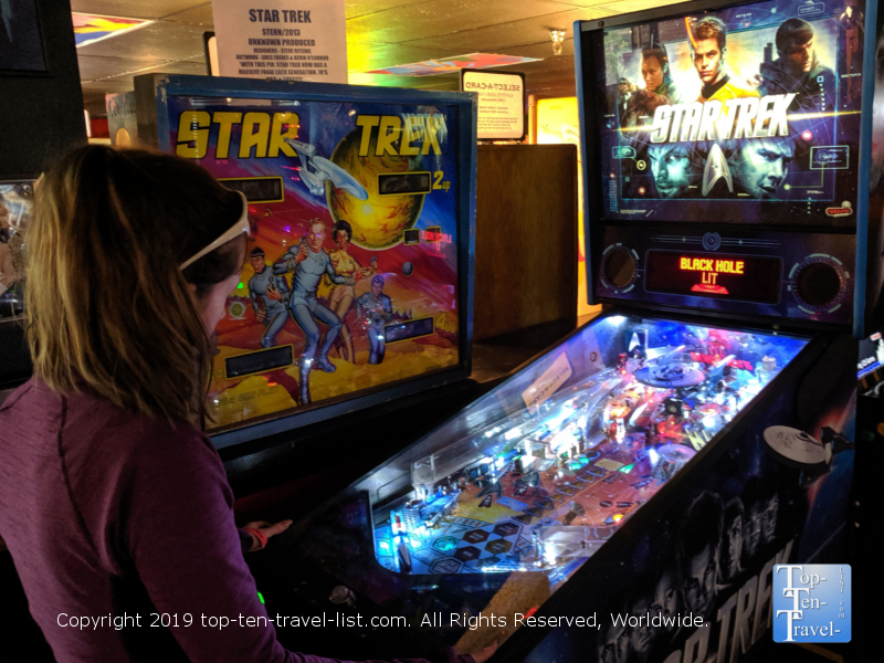 Playing a Star Trek pinball machine at the Asheville Pinball Museum