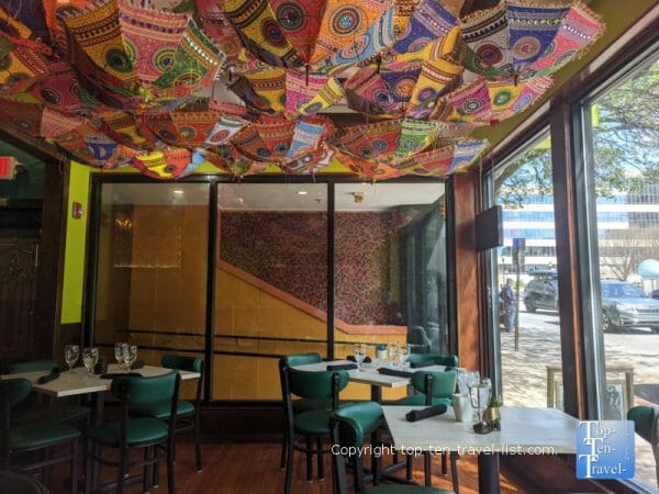 Colorful interior of Mehfil Indian restaurant in Asheville, NC