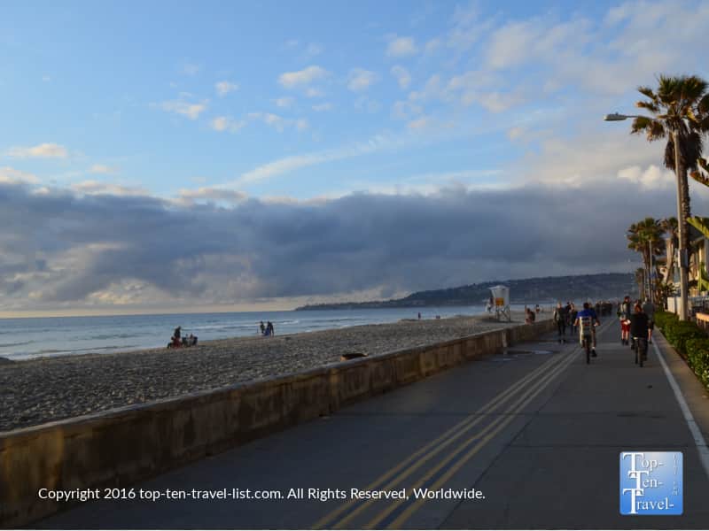 Biking along the beautiful Mission Beach boardwalk in San Diego, CA