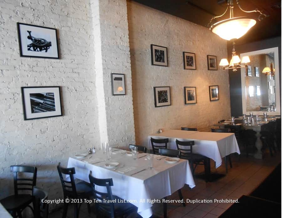 Brick walls and photography at Pizzico Ristorante in Providence, Rhode Island