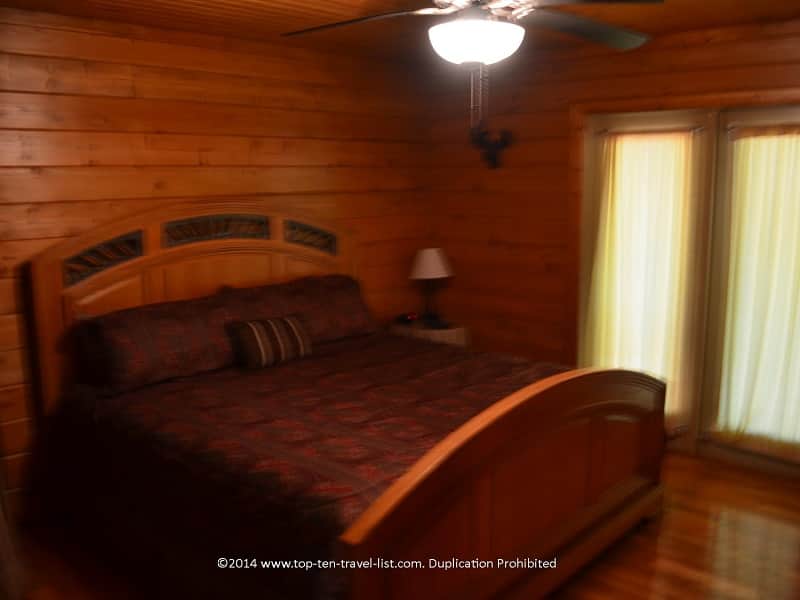 Rustic bedroom at Mount Laurel Cabin rentals