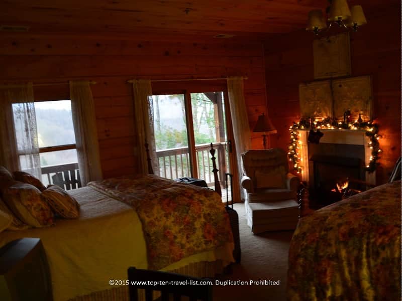 One of the charming Lazy Bear guest rooms, complete with a fireplace and great mountain views!