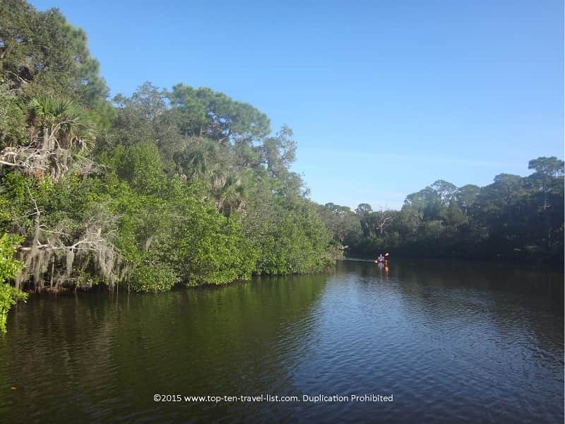 A kayaker enjoying a warm winter day on South Creek 