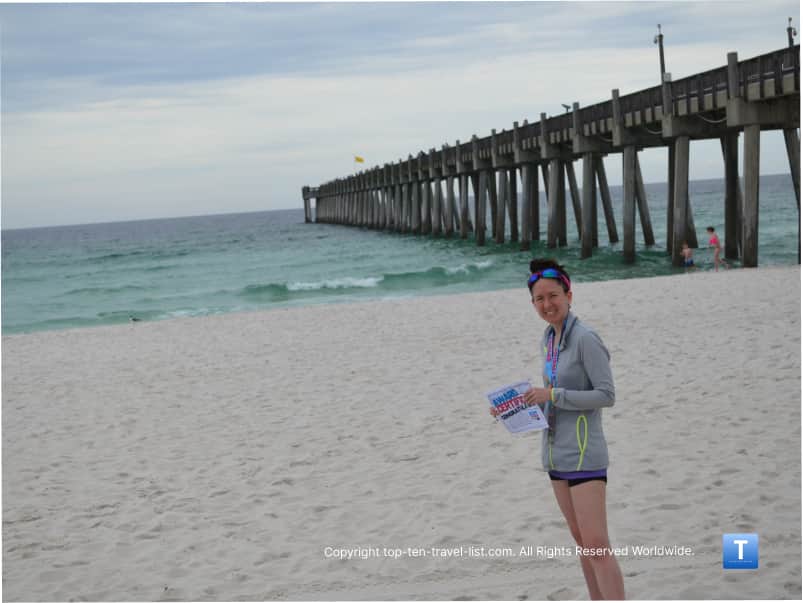 Standing by the Pensacola Beach pier after a half marathon