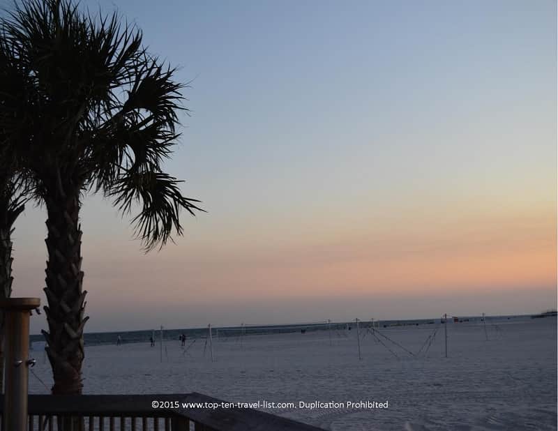 Palm tree and sunset on Gulf Shores beach