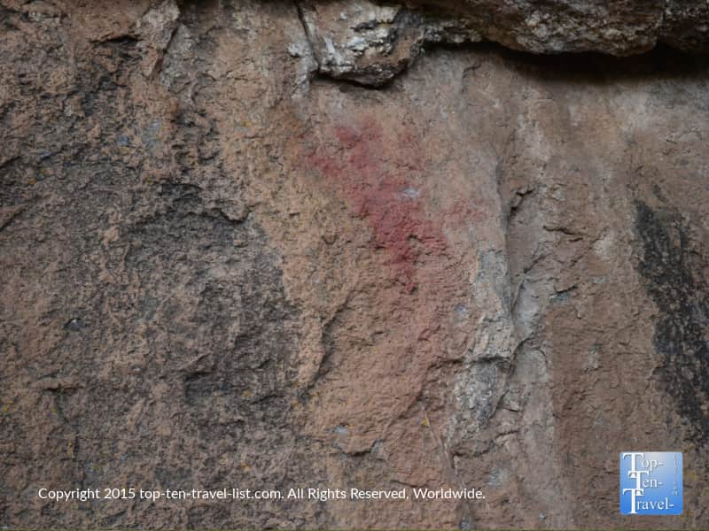 Faint red pictograph handprint on the Veit Springs loop trail in Flagstaff