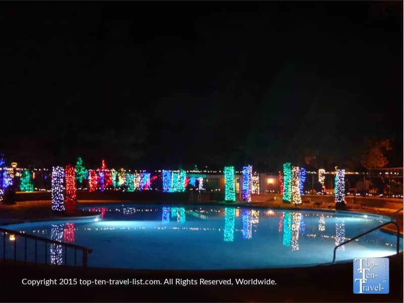The Little America hotel pool surrounded by Christmas tree lights