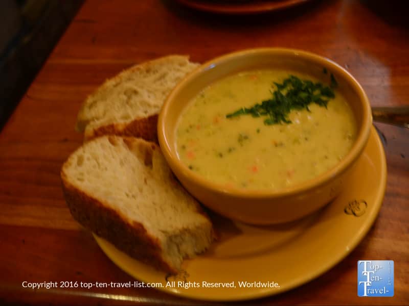 Delicious broccoli cheese soup with a side of whole grain bread at Wildflower