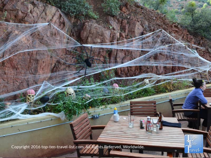 Spider webs Halloween decor on the patio of The Asylum Restaurant in Jerome, Arizona