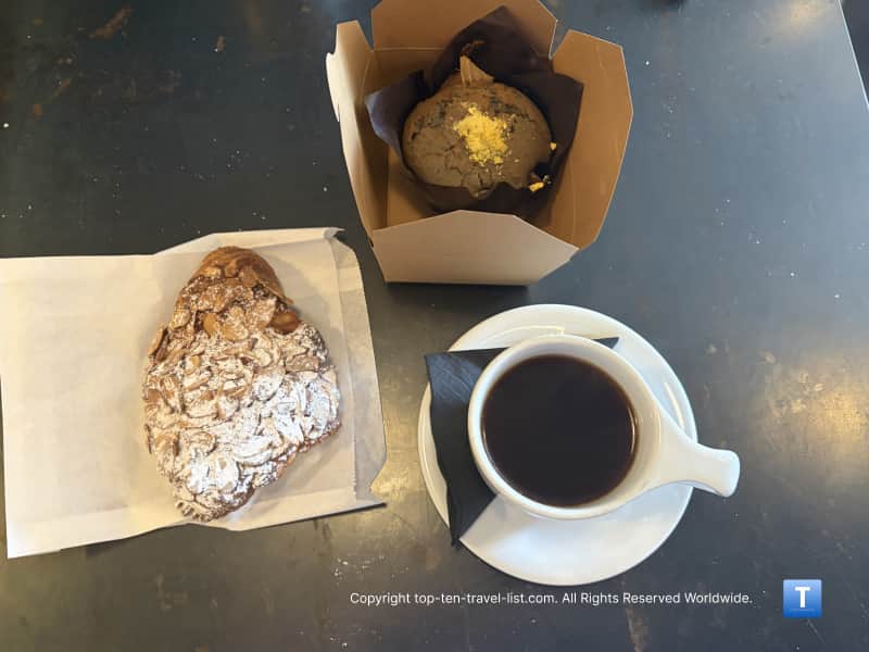 Blue corn cream cheese muffin & almond croissant at Cartel