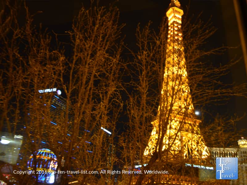 The Eiffel Tower lit up at night as seen from the Paris Las Vegas hotel