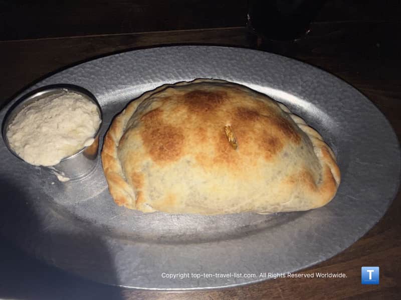 Guinness Stew Pasty with a side of tahini at Cornish Pasty Co.