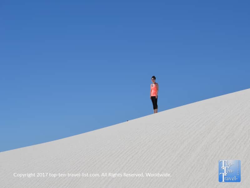 Standing atop a sand dune at White Sands National Monument in New Mexico