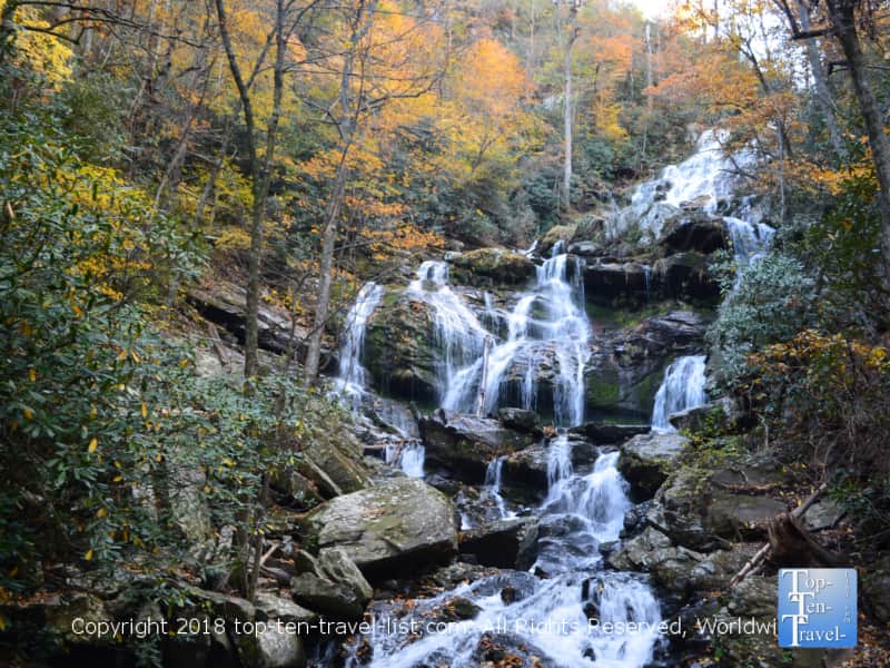 Fall colors surrounding the beautiful Catawba falls waterfall in North Carolina