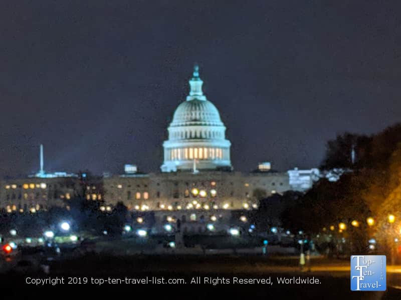 View of the Capitol Hill building in DC lit up at night