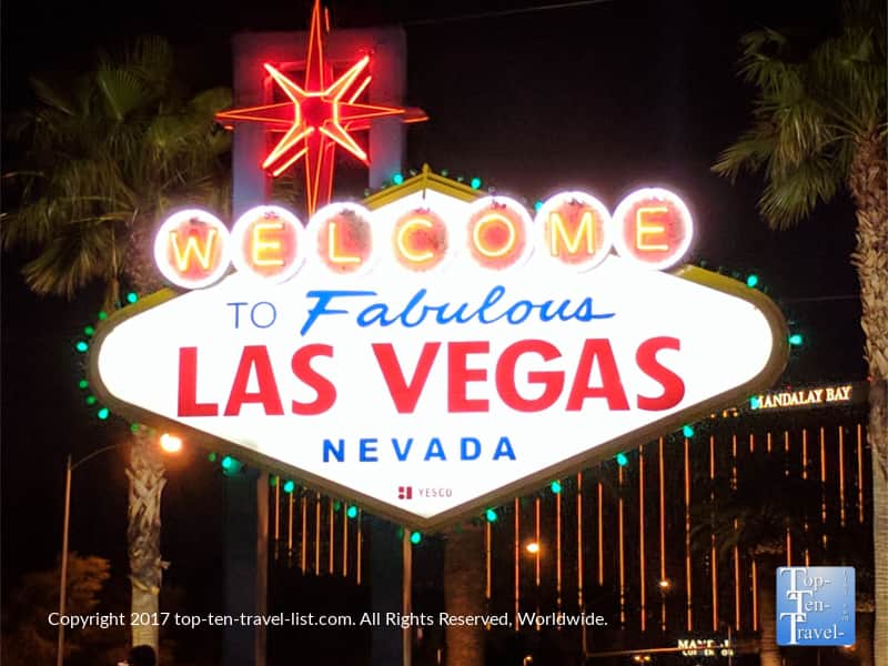 Welcome to Las Vegas sign lit up green for St. Patrick's Day