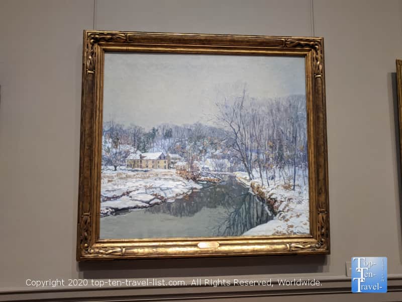 Beautiful winter scene painting at the National Gallery of Art west building in Washington D.C.
