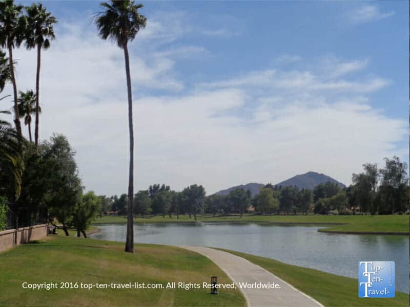Lush greenery and mountain views along the Indian Bend bike path in Scottsdale, Arizona