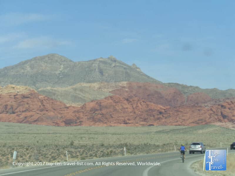 Cyclist on the road at Red Rock Canyon in Nevada 