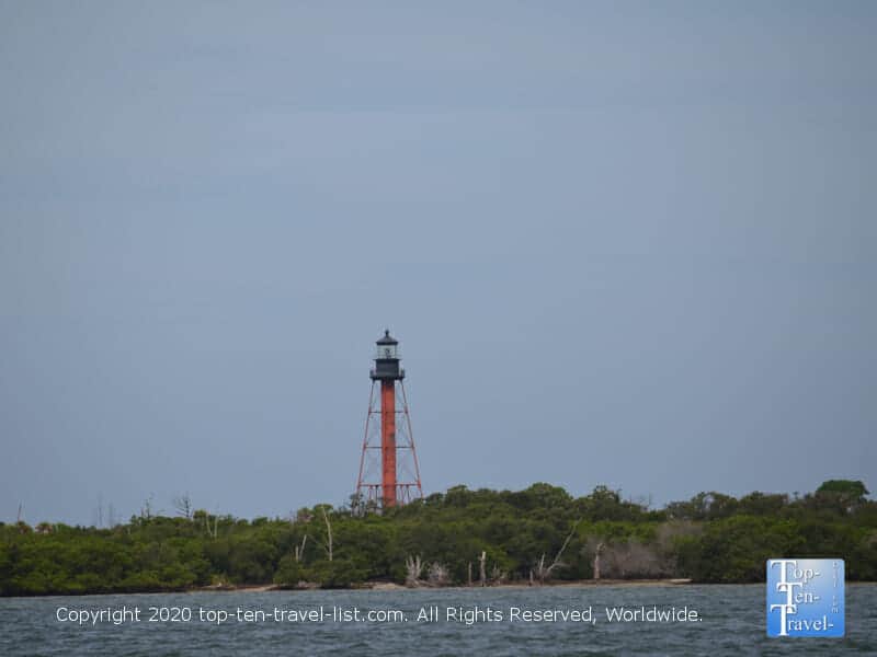 Anclote Island lighthouse seen from the Odyssey Dolphin cruise in Tarpon Springs, Florida 