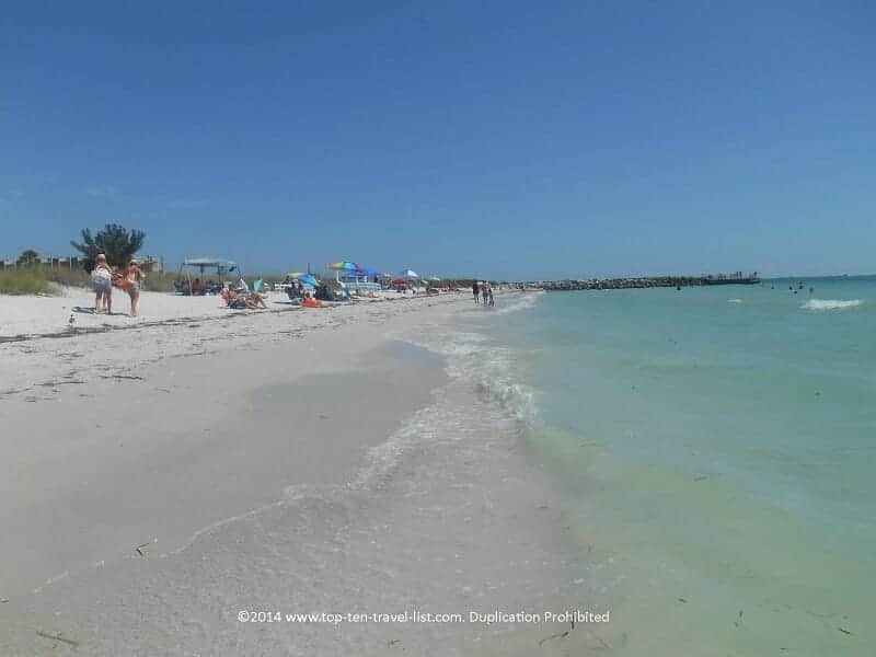 People sunbathing at Pass-A-Grill beach in St Pete