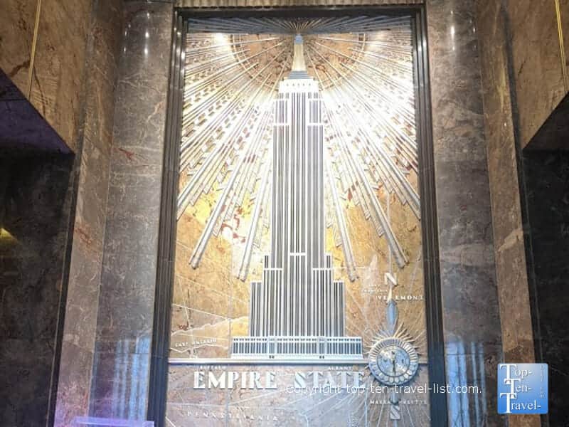 Marble mural in the lobby of the Empire State building in NYC