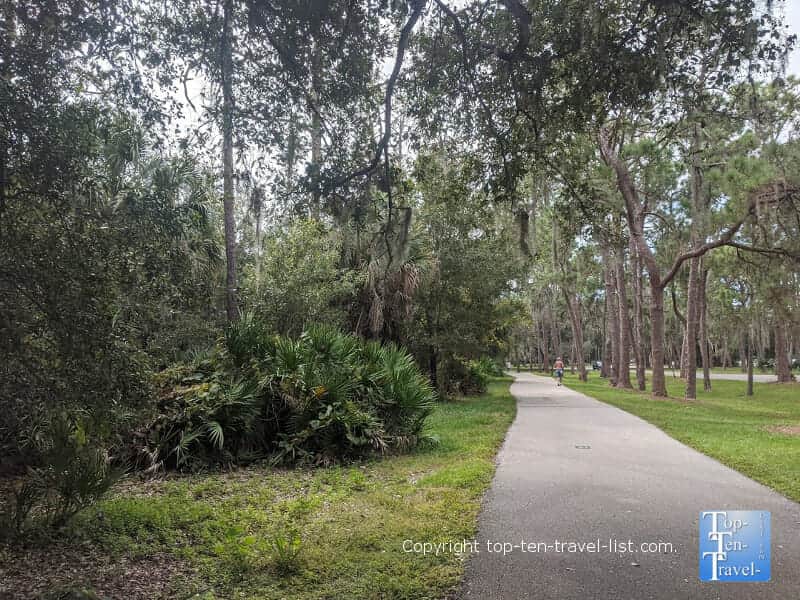 Shady bike trail at Lake Seminole Park in Largo, Florida 