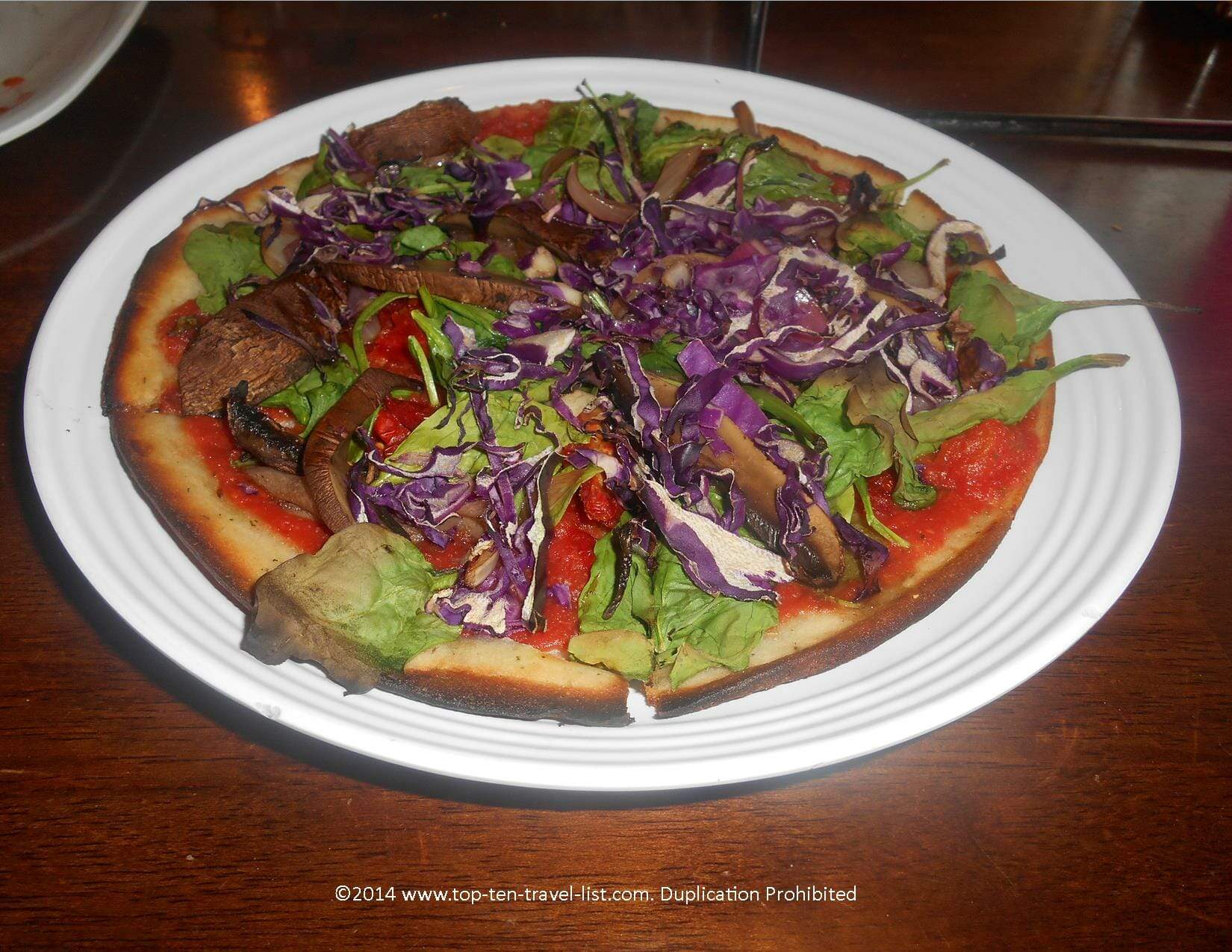 Cheeseless vegan, GF pizza at Gourmet Pizza Company in Tampa, Florida