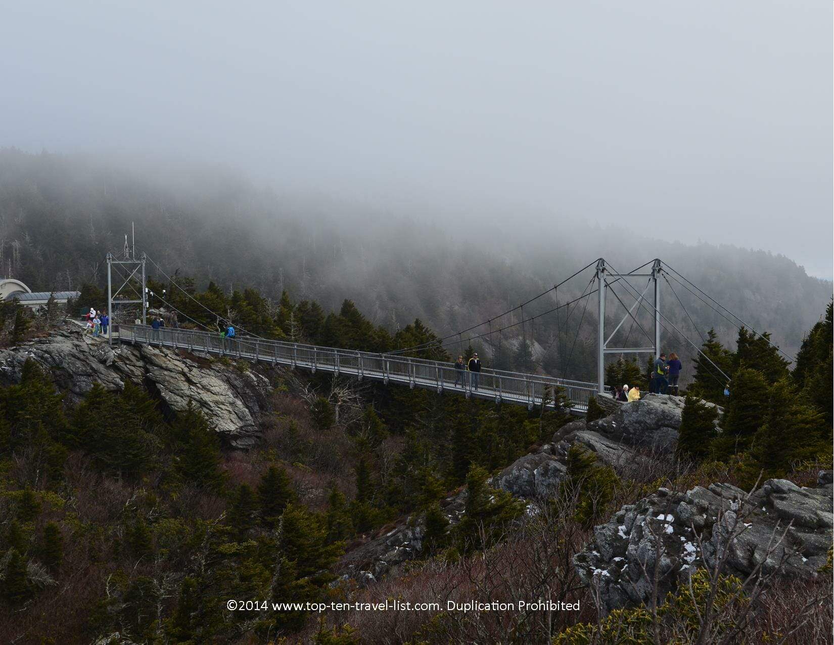 A misty morning crossing the suspension bridge at Grandfather Mountain in Western North Carolina 