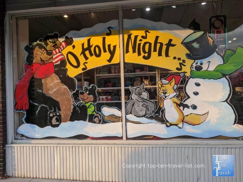 Holiday snowman window display in Hendersonville, North Carolina