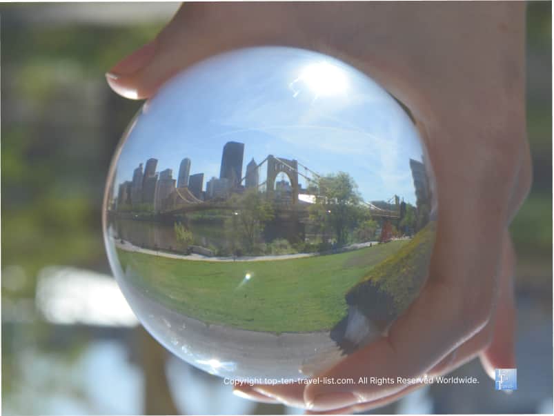 The beautiful Pittsburgh skyline taken with glass ball photography