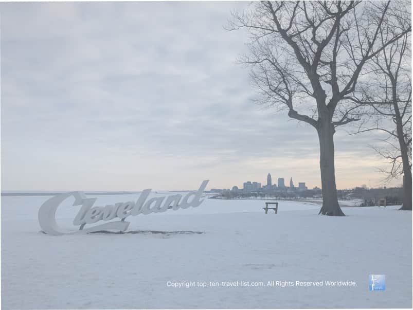 Cleveland script sign in the snow
