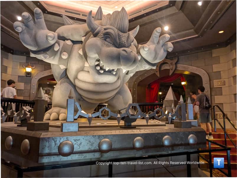 Bowser statue on the Mario Kart ride at Super Nintendo World