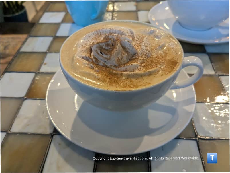 Seasonal Pumpkin Swirl Latte at Roasted coffeeshop in Tremont