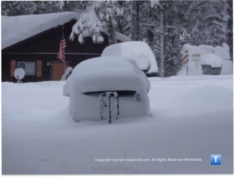 Car buried in snow in Kachina Village