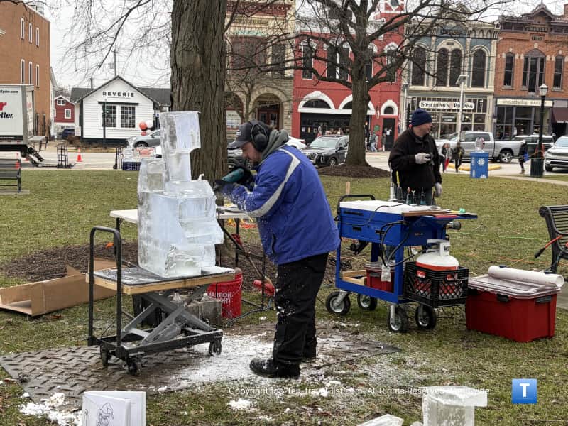 Elegant Ice Creations carving at a Medina event